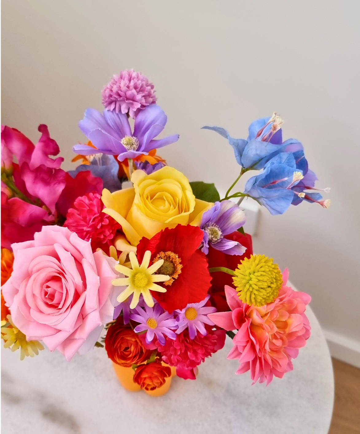 Colorful emily bouquet with roses, daisies, and dahlias